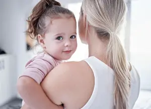 Carry Prints: Family, love and care between mother and daughter bonding and spending free time together during day at home