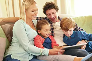 Streaming Prints: Family, tech and together on couch for streaming with happiness