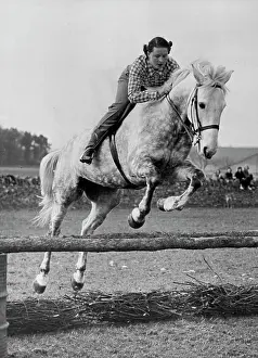 Jumping Prints: Famous Pair In Training -- A fine action shot of Miss Pat Smythe and her equally-famous grey horse 'Tosca'