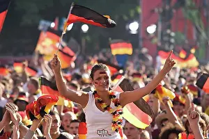 Share Prints: Fans with German flags watching the final game of the football EM on the Berlin fan mile