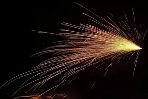 Dunkel Prints: Fantastic sparks in the dark shot Fantastic red and orange sparks in the dark shot