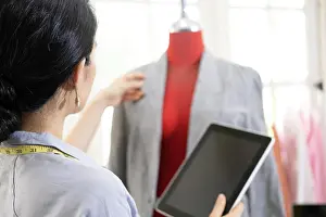 Fitting Prints: Fashion designer working in atelier