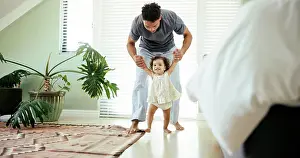 Holding Hands Prints: Father, child and learning to walk in home with holding hands