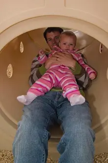 Freetime Prints: A father and child playing in a playground near Squaw Valley California