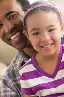 Bame Prints: Father and daughter smiling, portrait