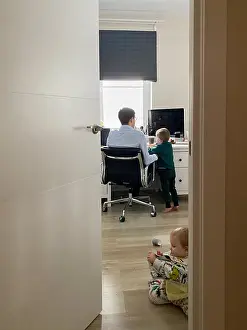 Father Prints: father trying to work at home on self isolation with children