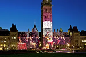Justice Prints: Fathers of Confederation projected on Parliament Building, Ottawa, Ontario, Canada