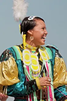 One Young Woman Only Prints: Female dancer in jingle dance regalia at powwow