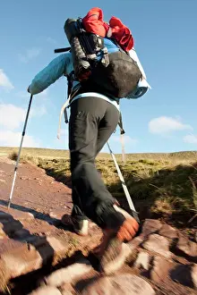 Hike Prints: female hiker walking up towards Pen Y Fan in Wales