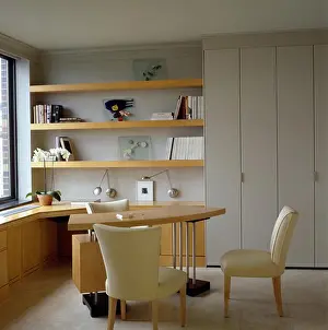 Home Office Prints: Keep the files in the cupboards then this home office corner in your home will not be overpowering