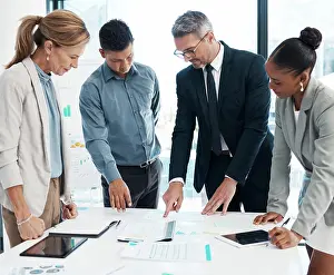 Workforce Prints: Finance, data and business people working on a graph in a modern office