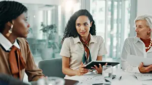 Paperwork Prints: Finance, meeting and tablet with business women in boardroom of office for planning or strategy