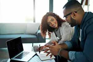Paperwork Prints: Financial, budget notebook or happy couple with laptop