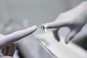 Technologies Prints: Finger touch glowing button on the mirror display. 3d technology in everyday life