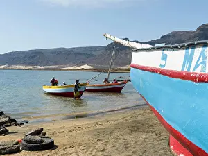Fisherman Prints: Fishermen getting ready to go fishing with traditional fishing boats near Baia das Gatas