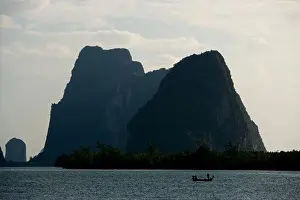 Rocks Prints: Fishing boat, Cliffy scenery, Phang-Nga Bay, Ao Phang Nga Nation Park, Phang Nga, Thailand