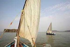 Industry Prints: Fishing boats with sails on the Arabian sea coast; Murud, Maharashtra, India