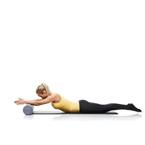 Balance Prints: Fitness, foam roller and woman in a studio for exercise