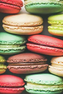 Back Ground Prints: Flat-lay of sweet colorful French macaroon cookies stacked in rows