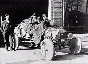 Students Prints: Flora, Indiana: 1917 Two college students are prepared for a cold ride in an open car