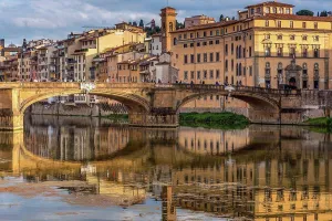 Florence Prints: FLORENCE, TUSCANY/ITALY - OCTOBER 18 : View of buildings along and across the River Arno in Florence on October 18