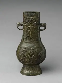 Features Prints: Flower vase with animal-head handles 13th-14th century China This lively vase features the Yuan-dynasty creative
