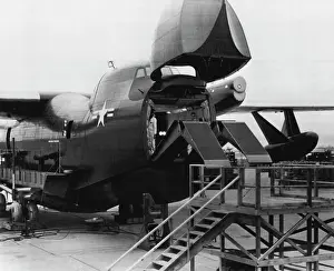 Flying LST -- Bow door open and the landing ramp unfolding