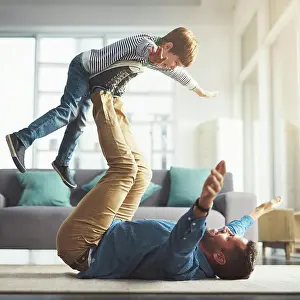 Games Prints: Flying, playing and dad with kid in home for bonding