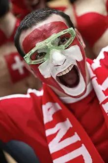 Share Prints: Football fan with their face painted in the Swiss national colours