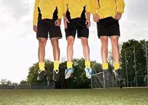 Out Door Prints: Three football guys jumping