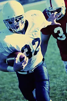 Uniform Prints: Football player running with the ball