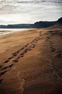 Footprints Prints: Footsteps through the sand Raudisandur