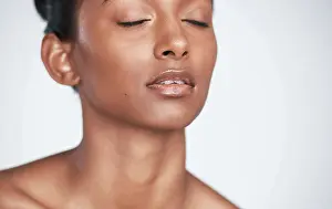 Foundation Prints: Foundation, beauty or closeup of woman for eyeshadow in studio on white background for facial glow