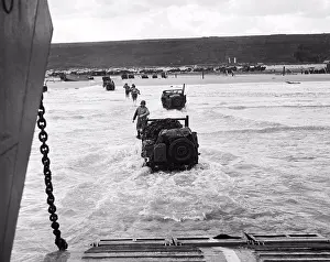 Soldiers Prints: France: June 9, 1944 Allied soldiers make a run for the beach
