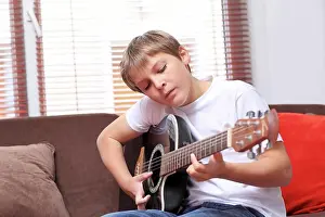 Minor Prints: France Young Boy Playing Guitar