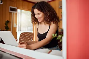 Organizing Prints: Freelance woman on a laptop working