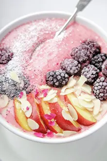 Beverage Prints: Fresh and cold strawberry banana smoothie garnished with peach slices
