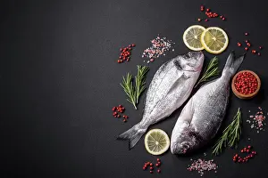 Fresh raw dorado fish with spices