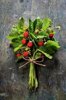Ingredient Prints: fresh Wild strawberries on wooden background - summer, healthy eating concept