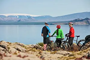 Small Group Prints: three friends cycling around Thinvallavatn lake in Iceland
