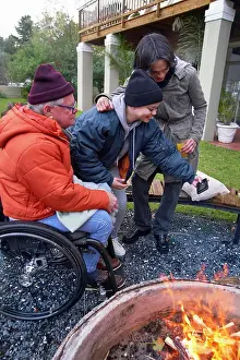 Disability Prints: Friends around fire pit