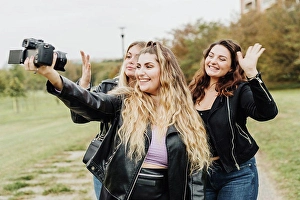 Voluptuous Prints: Friends taking selfie with camera