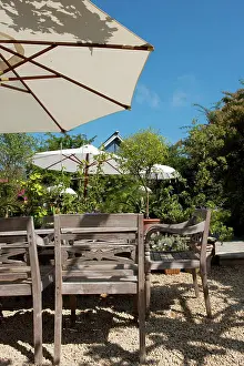 Garden of the restaurant Asian garden of the restaurant with white parasols Copyright: xZoonar