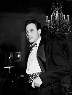 1953 Prints: George London, the Metropolitan Opera's new bass-baritone4 chooses hand-blocked leopard-print cummerbund
