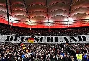 Benelux Prints: German fans, spectators, singing national anthem