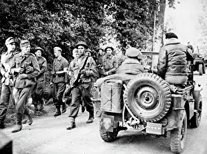 1944 Prints: German Prisoners Stare At Montgomery -- Germans taken Prisoner in Normandy Stare at Gen