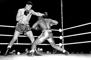 Compete Prints: Giant South African boxer wins first fight in London