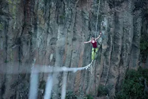 Rope Prints: One girl balancing on a highline at 'El Gato' canyon