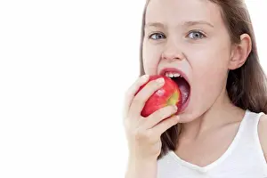 7 8 Years Prints: Girl biting apple