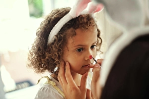 Bunny Prints: Girl, face paint and bunny ears for Easter